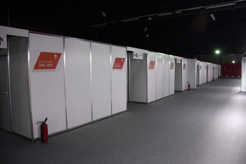 Illustration for article titled This Temporary Cubicle Hotel Is The Absolute Best Way To See Le Mans